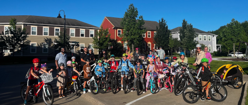 Bunch of kids getting ready to bike to school together!